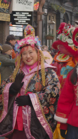 Vertical-Video-Of-Crowds-At-Parade-Around-Trafalgar-Square-In-London-UK-In-2023-To-Celebrate-Chinese-New-Year-